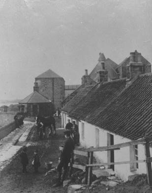 A group of people outside a building
Description automatically generated with low confidence